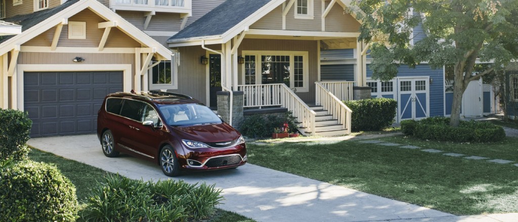 2017 Red Chrysler Pacifica parked in front of house