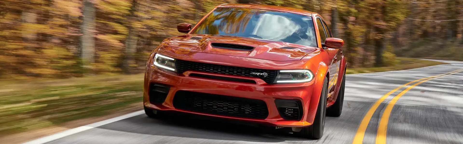 Orange Charger driving