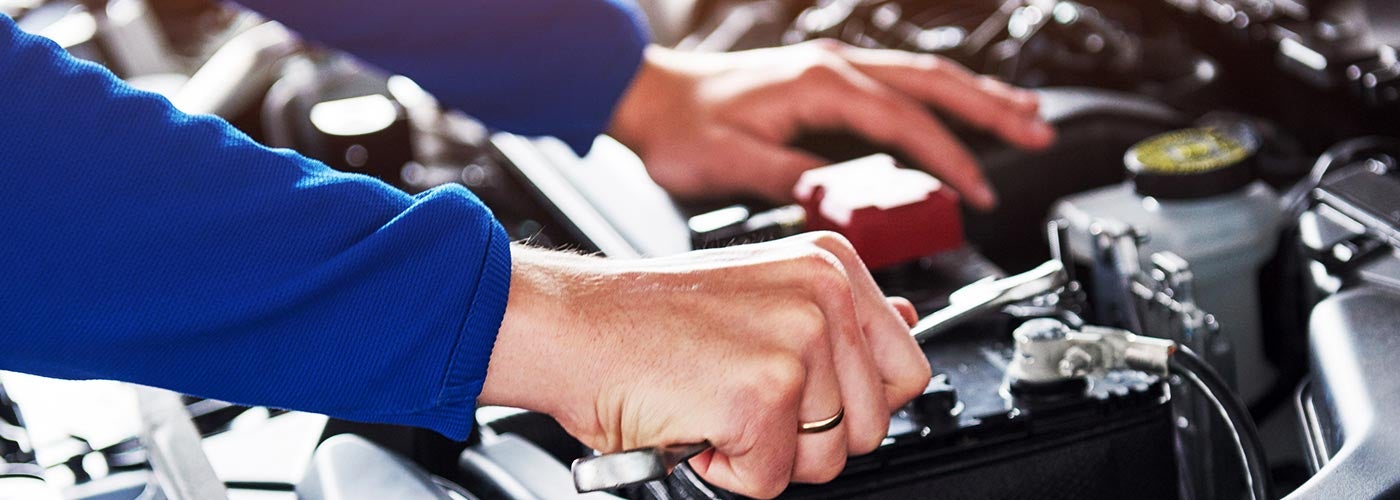 Technician changing battery